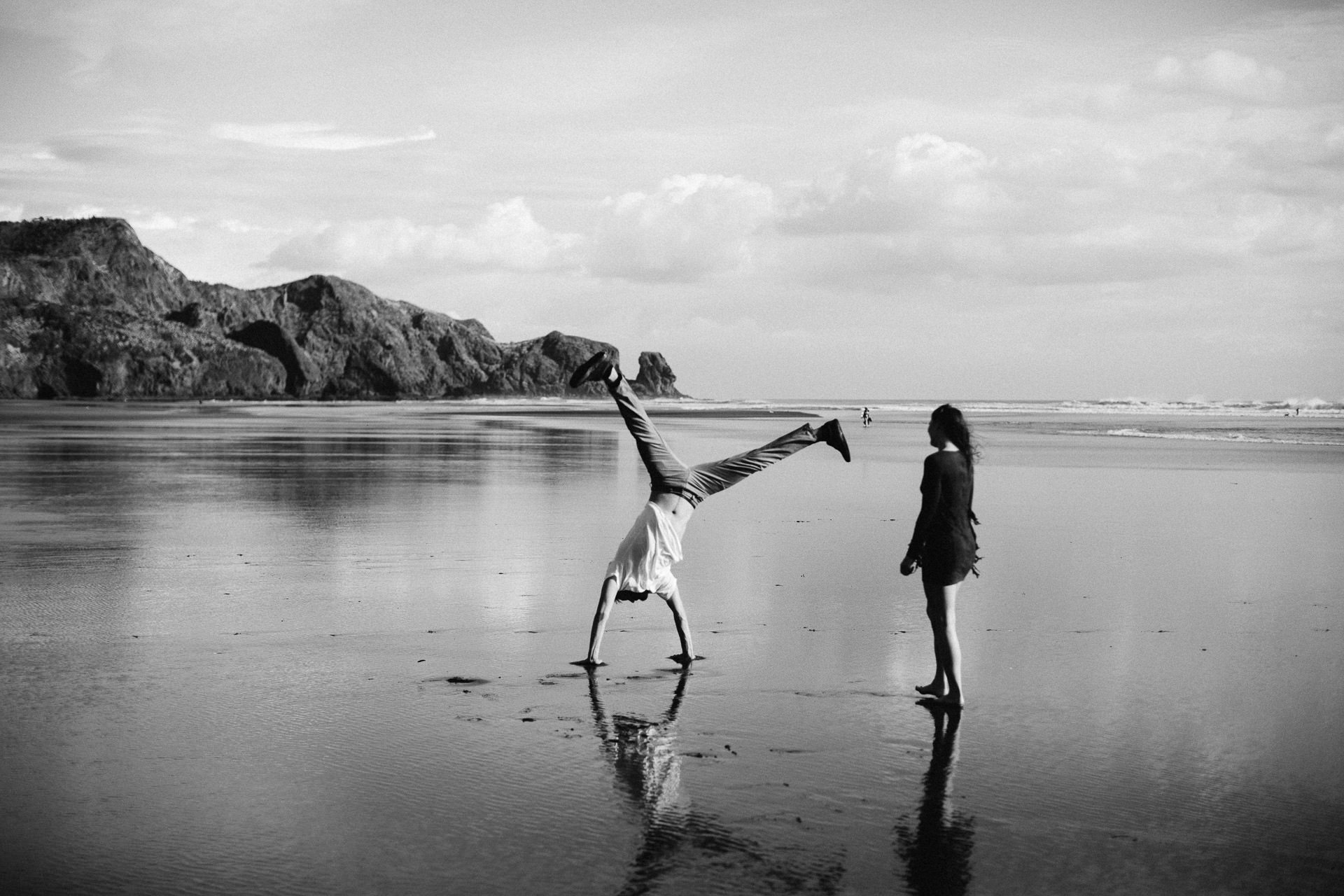 Amy & Daniel Piha Beach Engagement New Zealand by Jean-Laurent Gaudy