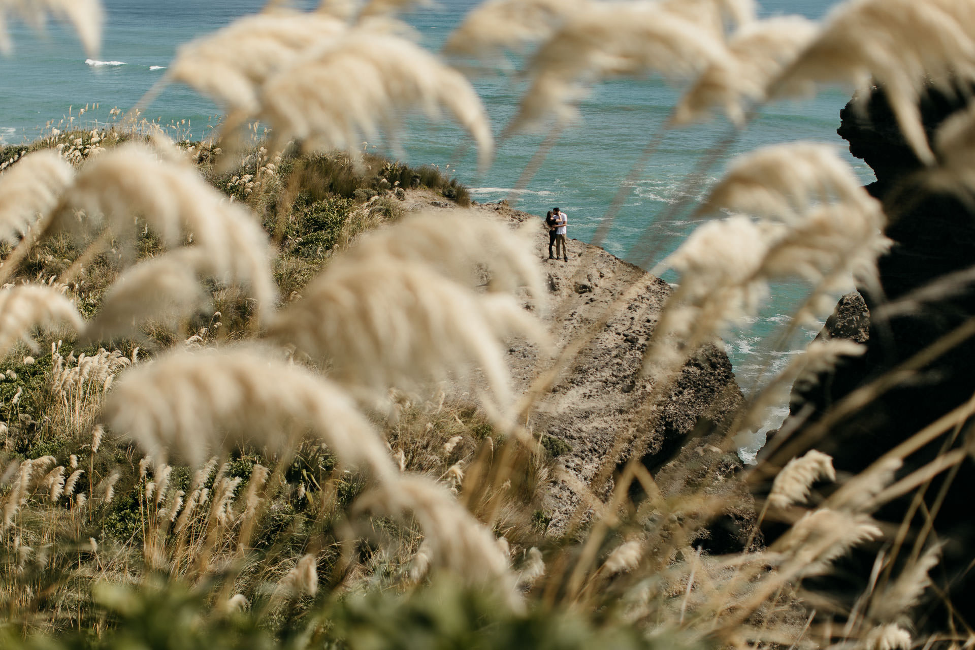 Amy & Daniel Piha Beach Engagement New Zealand by Jean-Laurent Gaudy
