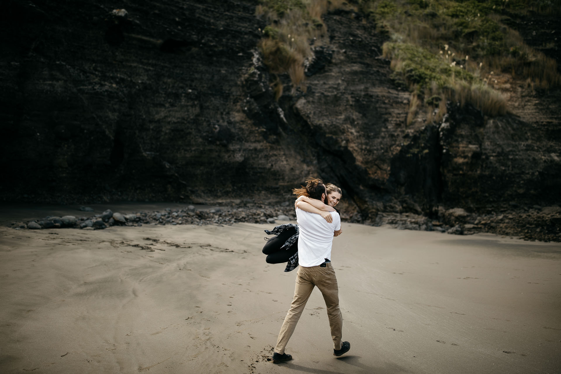 Amy & Daniel Piha Beach Engagement New Zealand by Jean-Laurent Gaudy