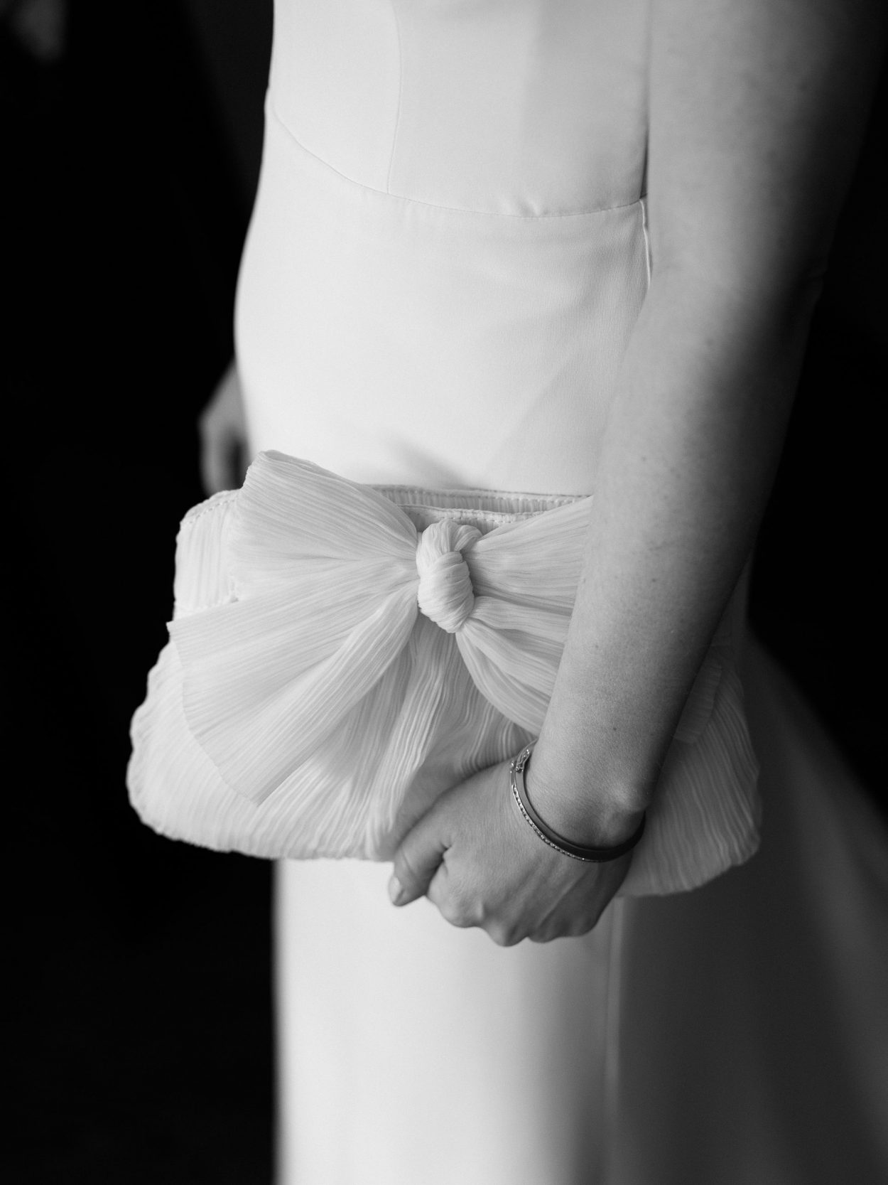 A stylish New York City wedding, rustic brick walls, velvet drapery, and golden candlelight, capturing the intimate, cinematic atmosphere of the iconic venue.